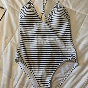 NWT Cupshe black and white striped v-neck one piece.